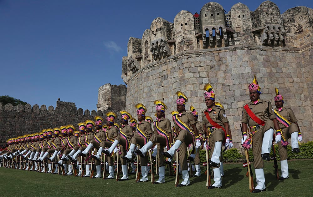 Policemen participate in the final rehearsal for the Independence Day celebrations at the Golconda Fort in Hyderabad.