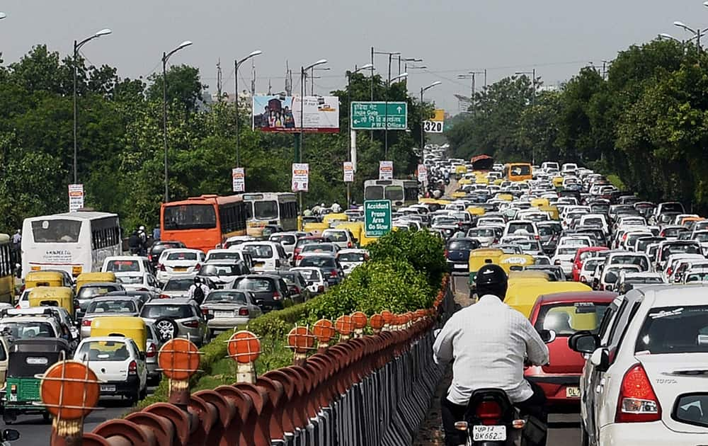 Vehicles stuck in a traffic jam at Nizamuddin bridge due to Independence Day rehearsals in New Delhi.