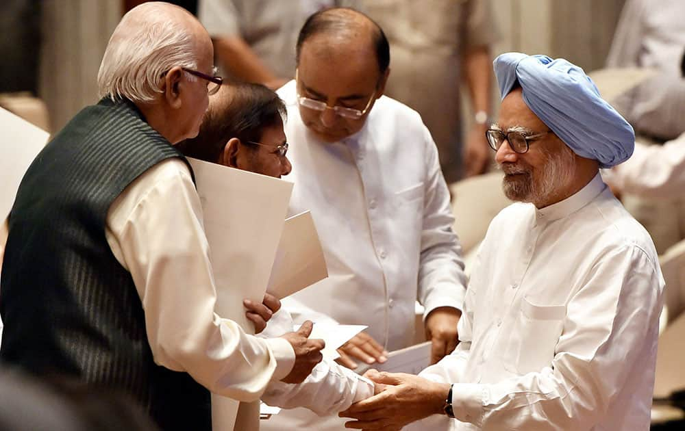 Former Prime Minister Manmohan Singh with Sharad Yadav, Arun Jaitley and senior BJP leader L K Advani at the Outstanding Parliamentarian Awards for 2010 2011 and 2012 in the Balyogi auditorium (PLB) in New Delhi.