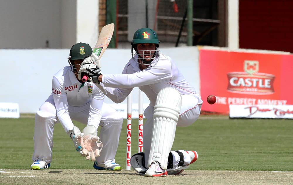 Zimbabwean batsman Brendan Taylor plays a shot during the cricket Test match against South Africa at the Harare Sports club, in Harare Zimbabwe.