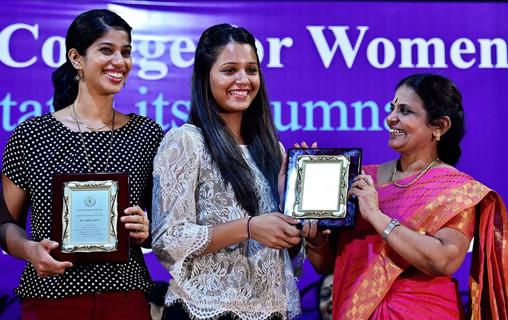 CWG squash gold medalists Dipika Pallikal and Joshna Chinappa at a felicitation programme at Ethiraj College for Women in Chennai.