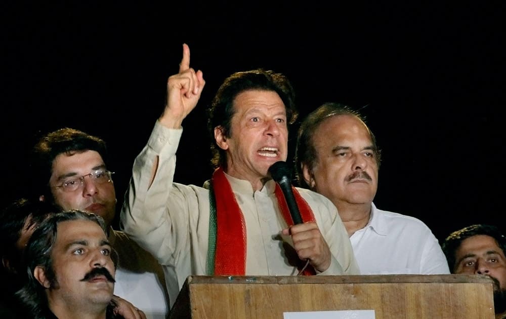 Pakistani cricketer-turned-politician Imran Khan delivers a speech during a protest in Islamabad, Pakistan.