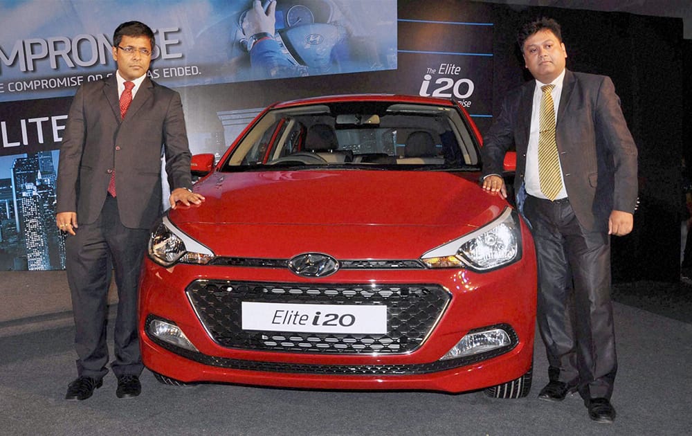 Zonal Manager of Hyundai Motor India Limited Tapan Kumar Ghosh and Regional Manager Bedabrata Bordoloi at the launch of Elite i20 car in Guwahati.