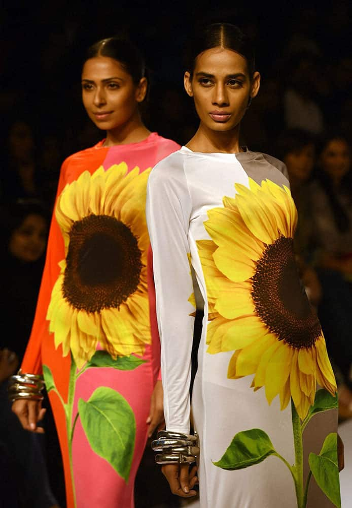 Models walk the ramp during Lakme Fashion Week Winter/Festive 2014 in Mumbai.