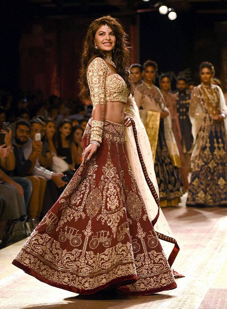 Bollywood actress Jacqueline Fernandez walks the ramp at Lakme Fashion Week Winter/Festive 2014 in Mumbai.