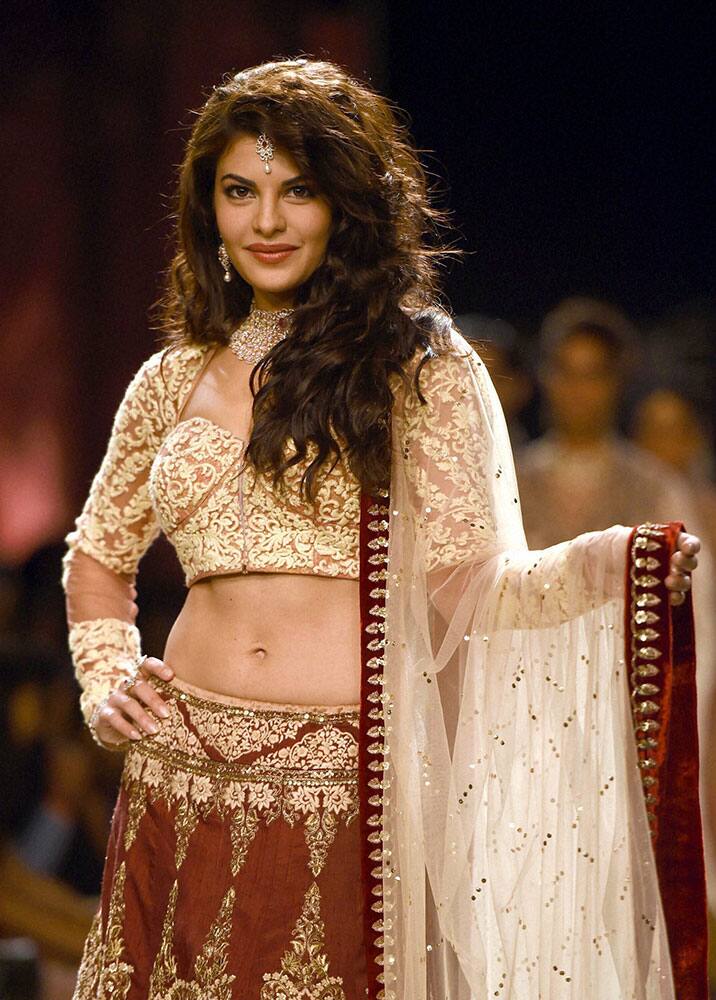 Bollywood actress Jacqueline Fernandez walks the ramp at Lakme Fashion Week Winter/Festive 2014 in Mumbai.