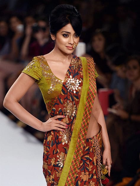 Shriya Saran walks the ramp at the Lakme Fashion Week Winter/Festive 2014 in Mumbai.