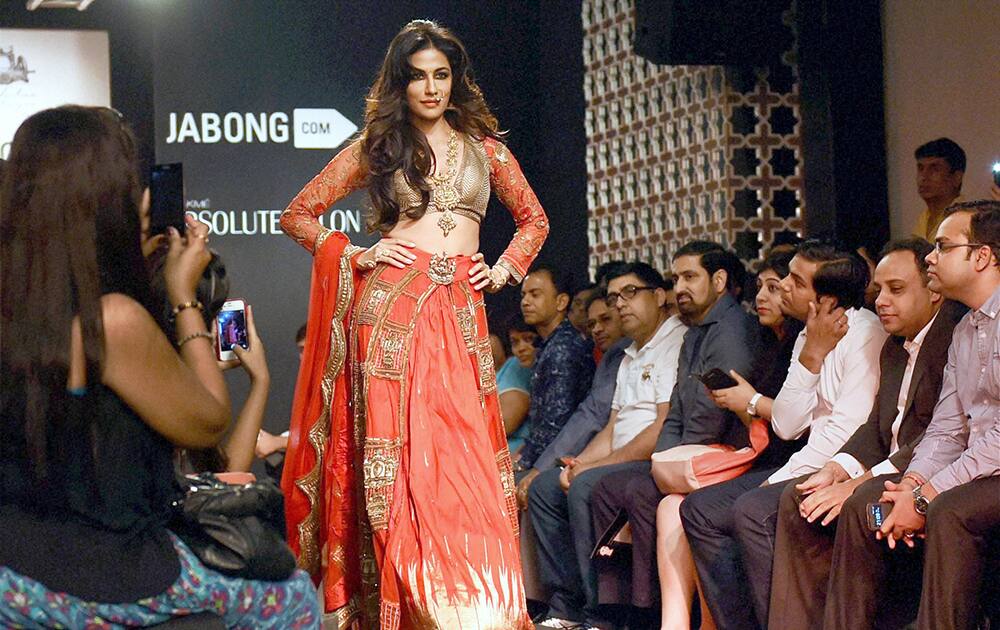 Bollywood actress Chitrangada Singh walks the ramp at the Lakme Fashion Week Winter/Festive 2014 in Mumbai.