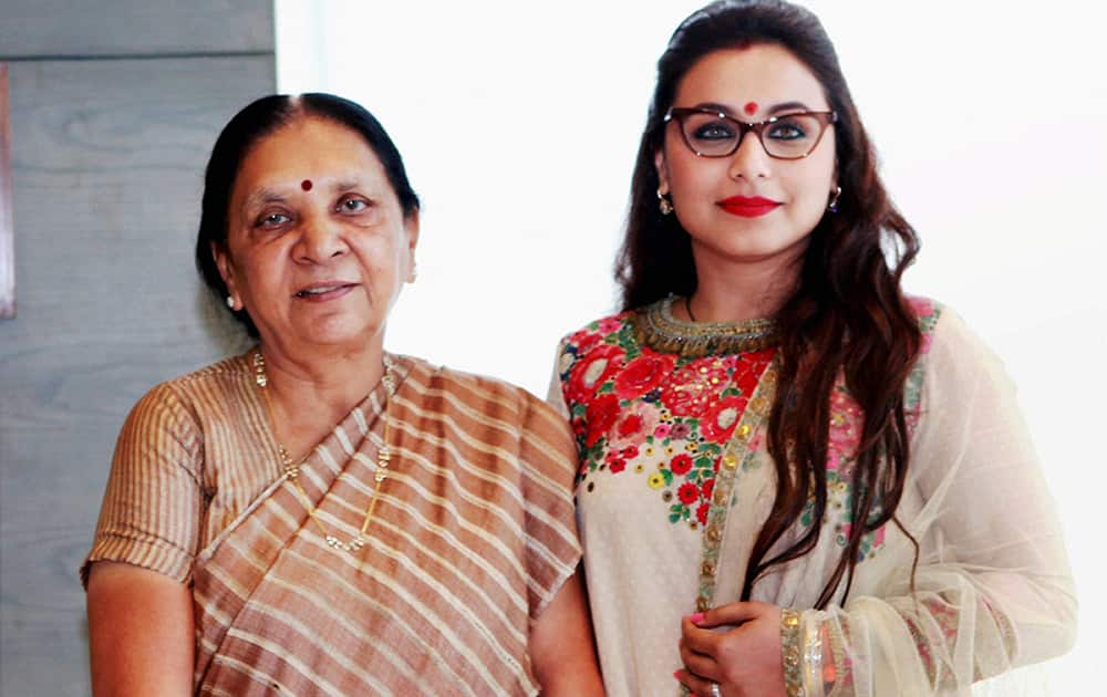 Rani Mukerji with Gujarat Chief Minister Anandiben Patel, during the promotion for her upcoming movie Mardaani in Ahmedabad.