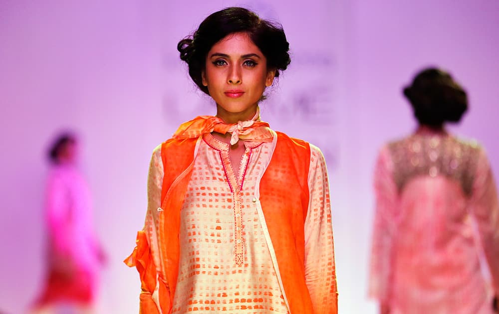 A model displays creations by Krishna Mehta on the second day of the Lakme Fashion Week in Mumbai.