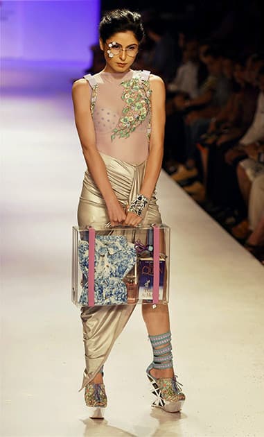 A model walks the ramp at the Lakme Fashion Week Winter/Festive 2014 in Mumbai.