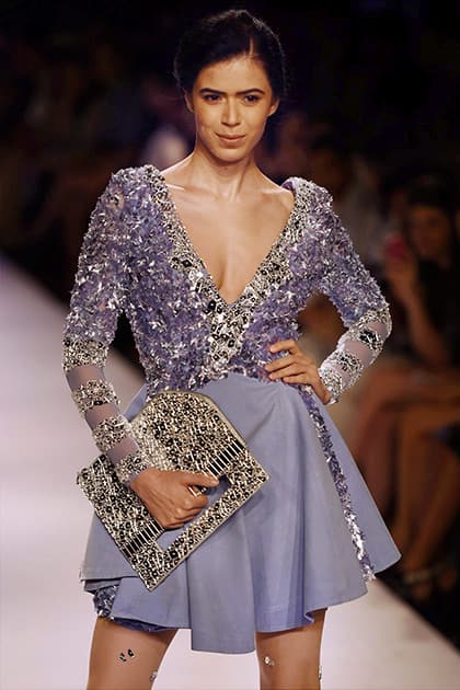 A model walks the ramp at the Lakme Fashion Week Winter/Festive 2014 in Mumbai.