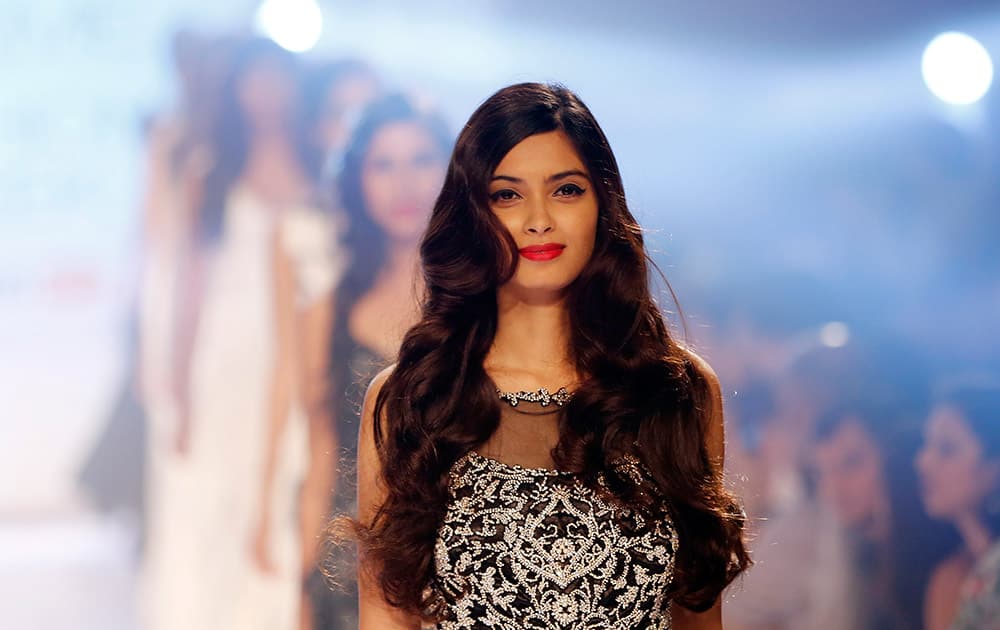 Bollywood actress Diana Penty displays a creation by Rocky Star during the Lakme Fashion Week in Mumbai.