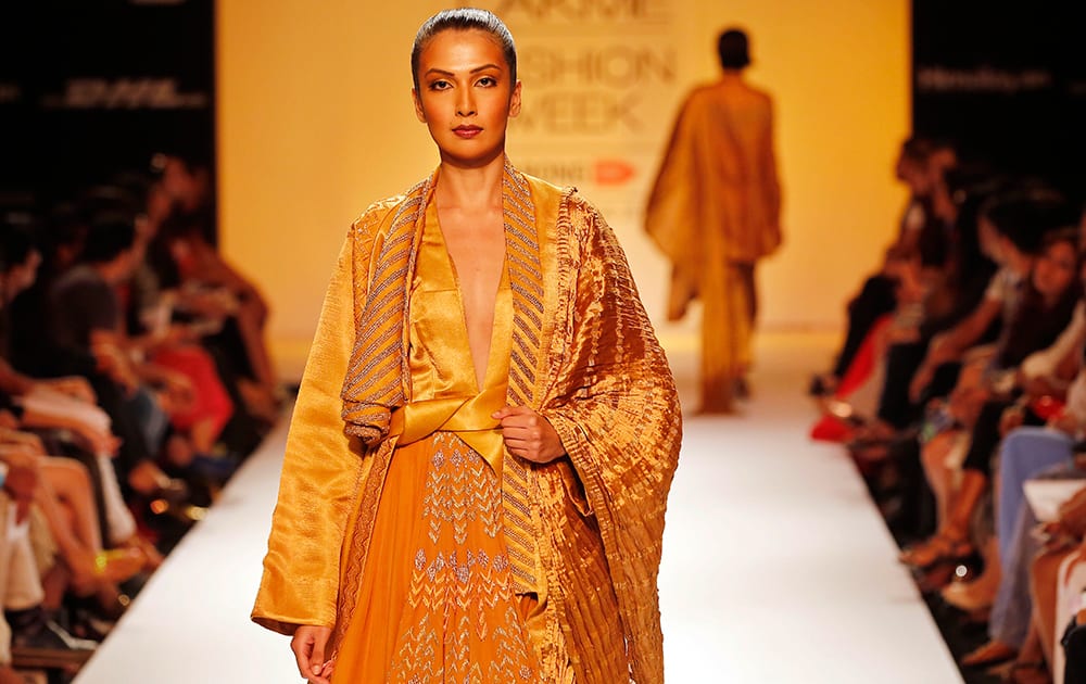 A model displays a creation by Nupur Kanoi during the Lakme Fashion Week in Mumbai