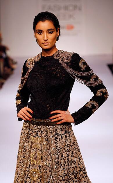 A model displays a creation by Monica and Karishma during the Lakme Fashion Week in Mumbai.