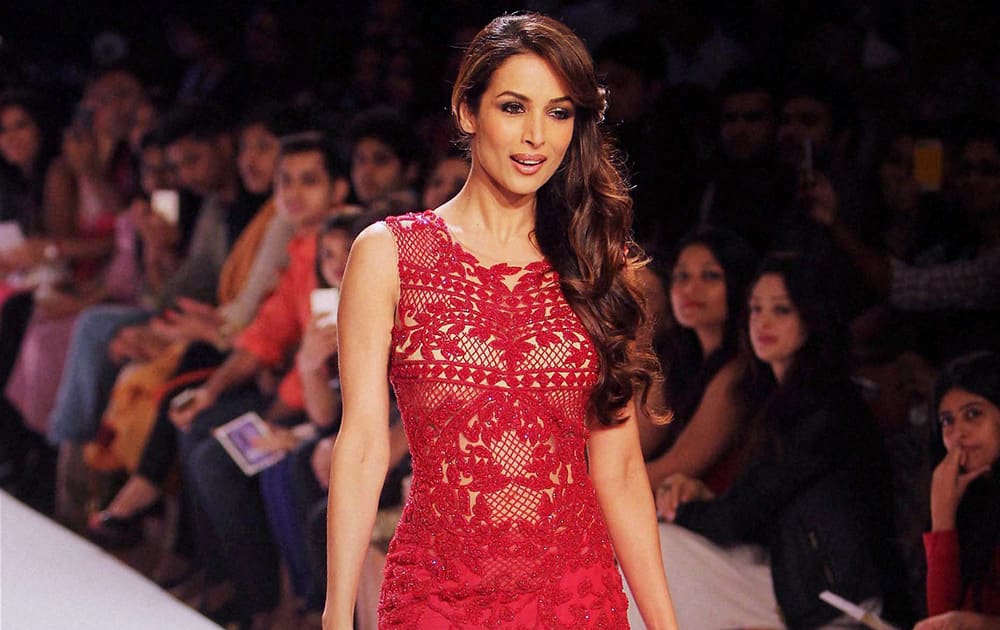 Bollywood Actress Malaika Arora Khan walks the ramp for designer, Sonakshi Raaj collection, during the Lakme Fashion Week Winter/Festive 2014, in Mumbai.