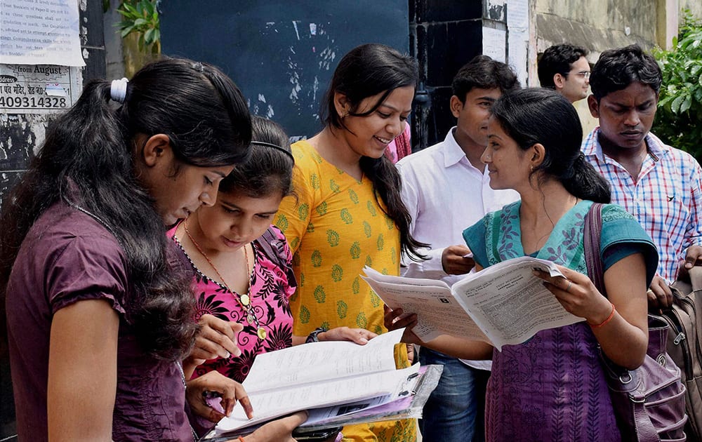 Students discussing with their friends after appearing for the Union Public Service Commission (UPSC) exam in Patna.