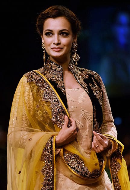 Bollywood actress Dia Mirza walks the ramp, displaying the collection of designer Vikram Phadnis, at the Lakme Fashion Week Winter/Festive 2014, in Mumbai 