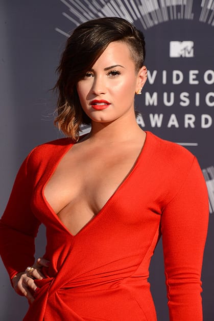 Demi Lovato arrives at the MTV Video Music Awards at The Forum in Inglewood, Calif. 