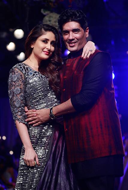 Kareena Kapoor poses for a picture with designer Manish Maholtra during the Lakme Fashion Week in Mumbai.