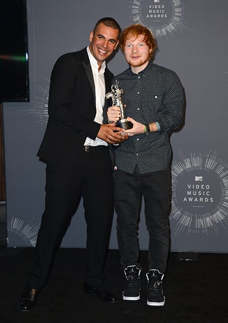 Emil Nava, left, and Ed Sheeran pose with the award for Best Male Video Award in the press room at the MTV Video Music Awards at The Forum in Inglewood, Calif.