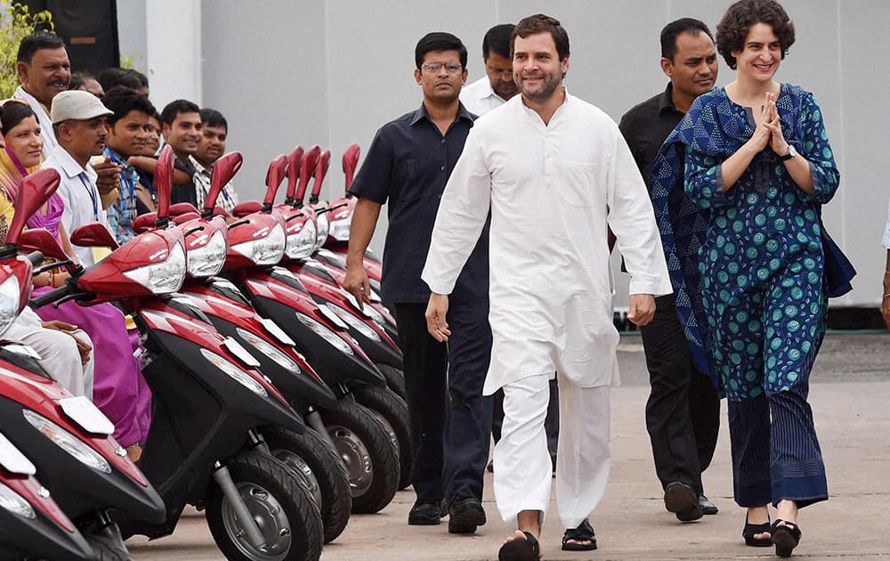 Congress Party Vice-President Rahul Gandhi with his sister Priyanka Vadra at a charity event to distribute three-wheel scooters to disabled persons in New Delhi.