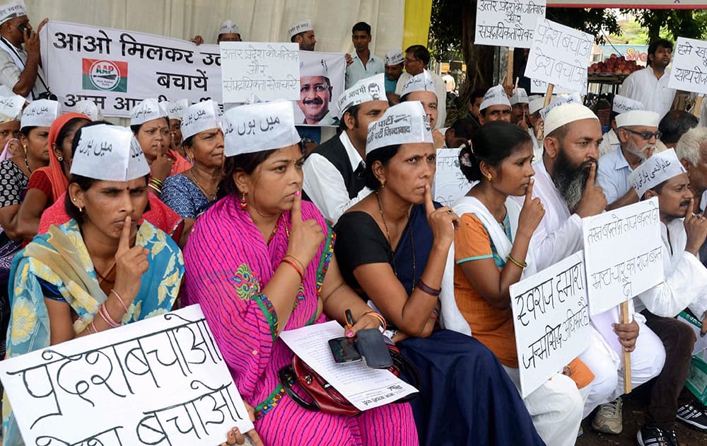 AAP worker holding a silent protest over the rising crime cases in Uttar Pradesh, in Allahabad.