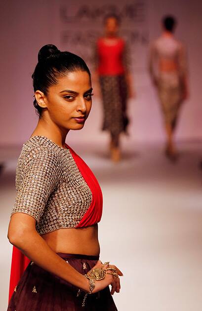 A model displays a creation by Payal Singhal during the Lakme Fashion Week in Mumbai.