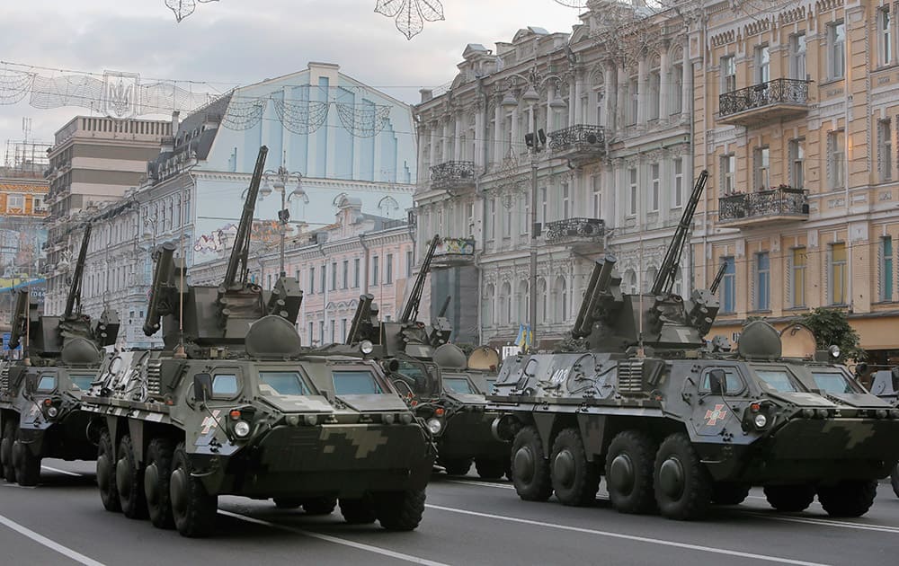 Ukrainian military vehicles pass during a parade rehearsal in central Khreshchatyk street in Kiev, Ukraine.