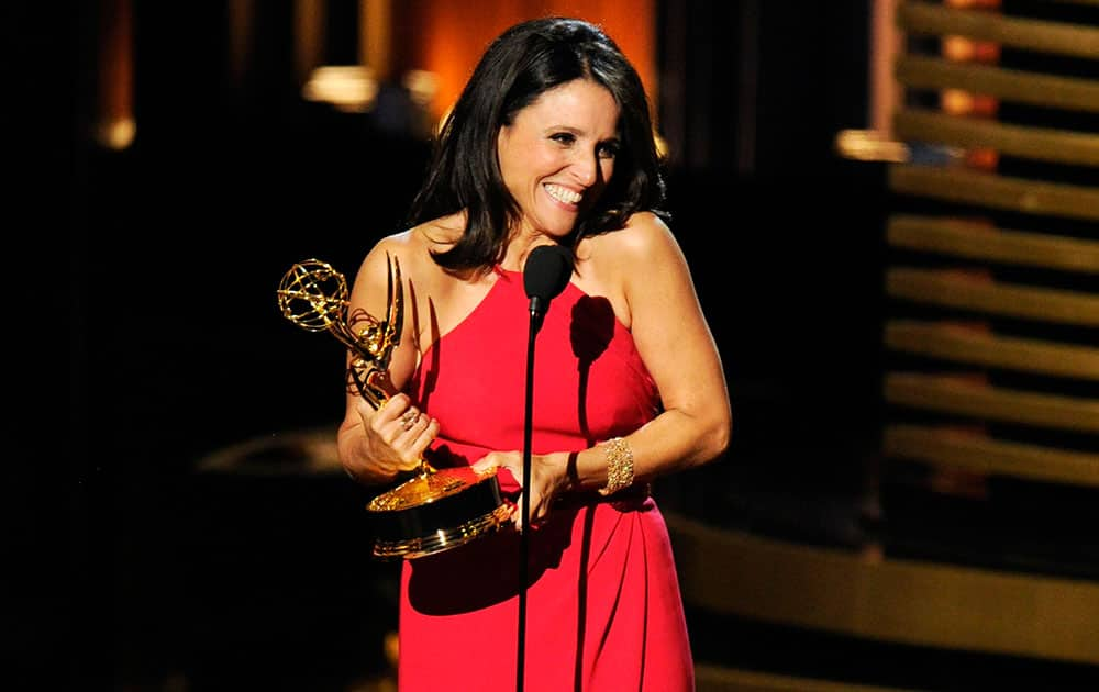 Julia Louis-Dreyfus accepts the award for outstanding lead actress in a comedy series for her work on “Veep” at the 66th Annual Primetime Emmy Awards at the Nokia Theatre L.A. 