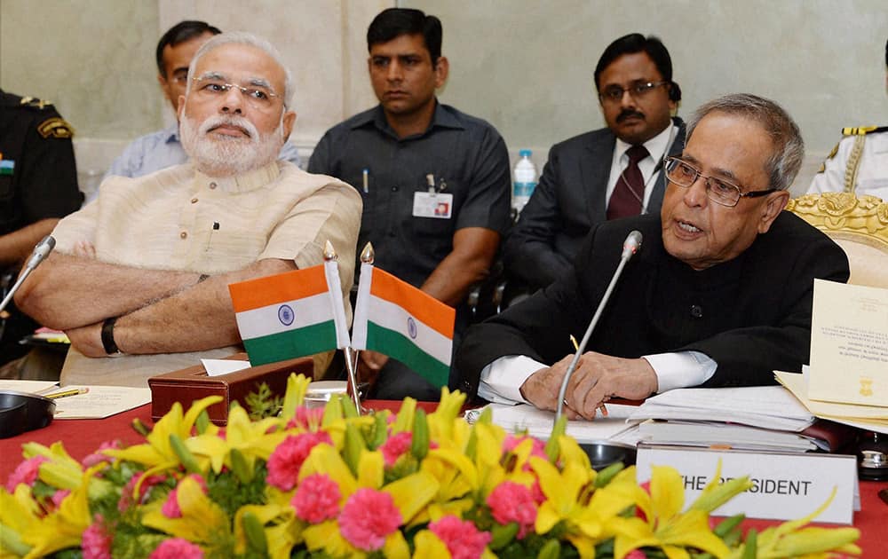 President Pranab Mukherjee addresses conference of Chairmen, Board of Governors and Directors of Indian Institute of Technology at Rashtrapati Bhavan in New Delhi on Friday. Prime Minister Narendra Modi is also seen.