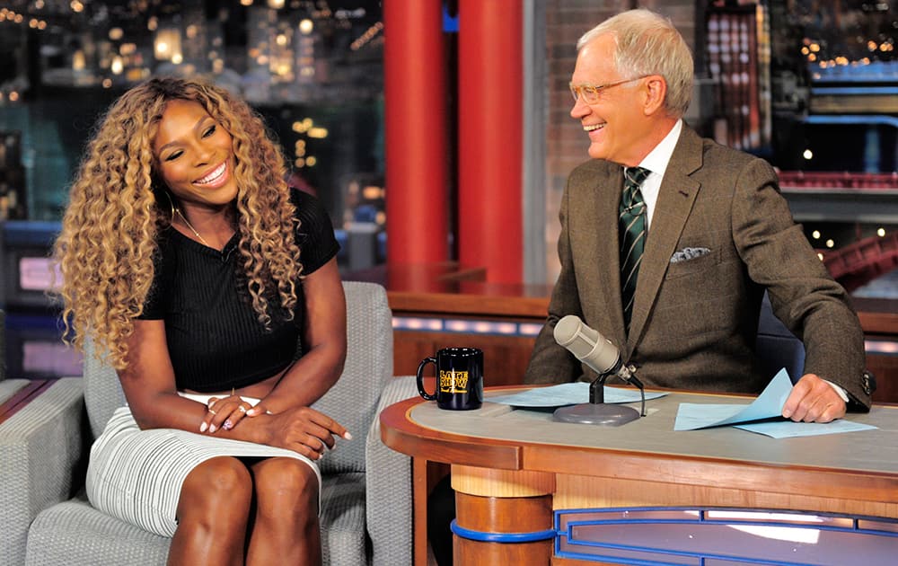 This photo provided by CBS, Serena Williams talks with host David on the set of the `Late Show with David Letterman,`, in New York. 