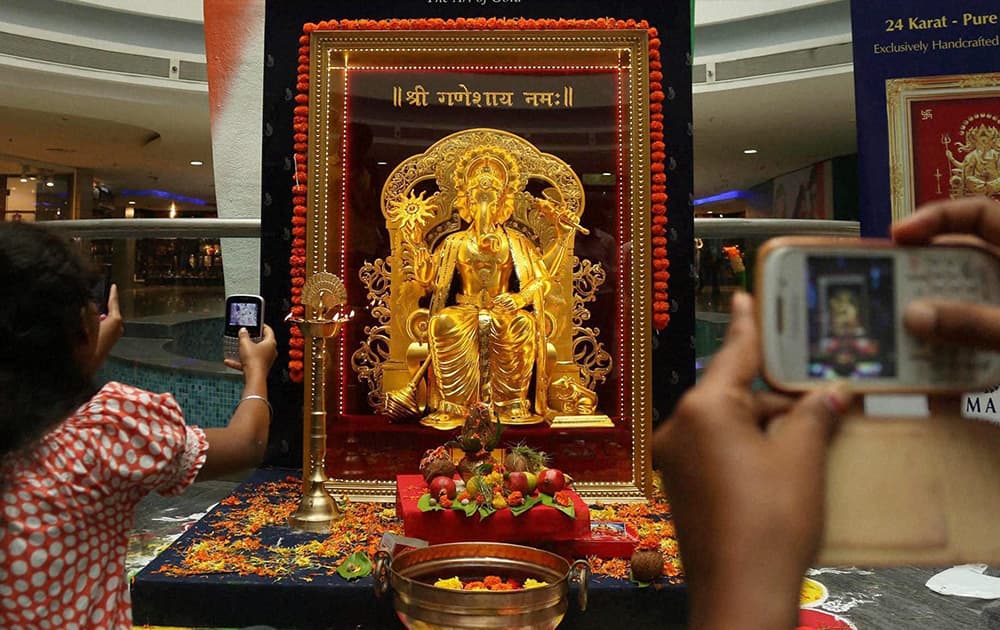 A golden Ganesha idol on display at a jewellery store in Mumbai.