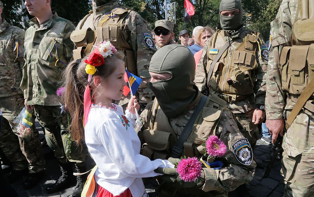 Relatives and friends say goodbye to volunteers before they were sent to the eastern part of Ukraine to join the ranks of special battalion unit fighting against pro-Russian separatists, in Kiev, Ukraine.