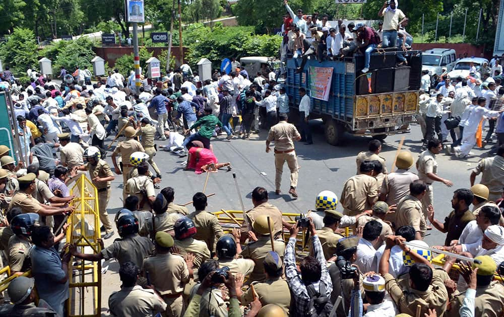 Police lathi charge BJP workers protesting against power cuts in Agra.