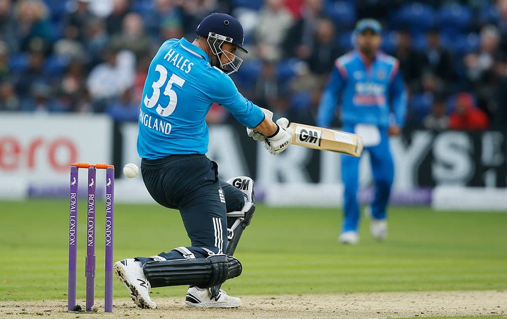 England's Eoin Morgan hits a ball bowled by India's Ravindra Jadeja during their One Day International cricket match at the SWALEC cricket ground in Cardiff, Wales.