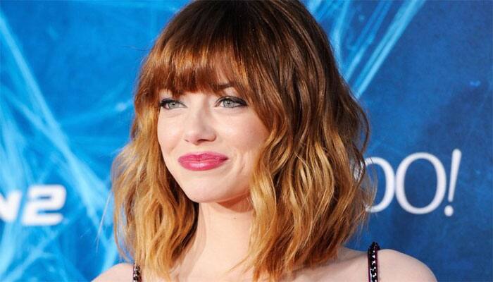 Emma Stone chops hair