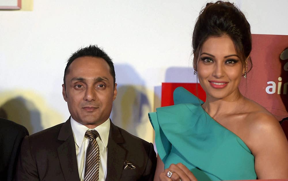 Bipasha Basu and Actor Rahul Bose launch registrations forms for the upcoming Airtel Delhi Half Marathon at a press conference, in New Delhi.