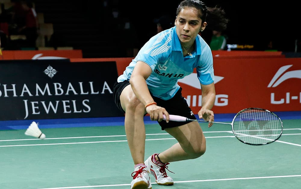 Saina Nehwal returns a shot to Japan's Sayaka Takahashi, during their match at the World Badminton Championships at Ballerup Arena, Denmark.