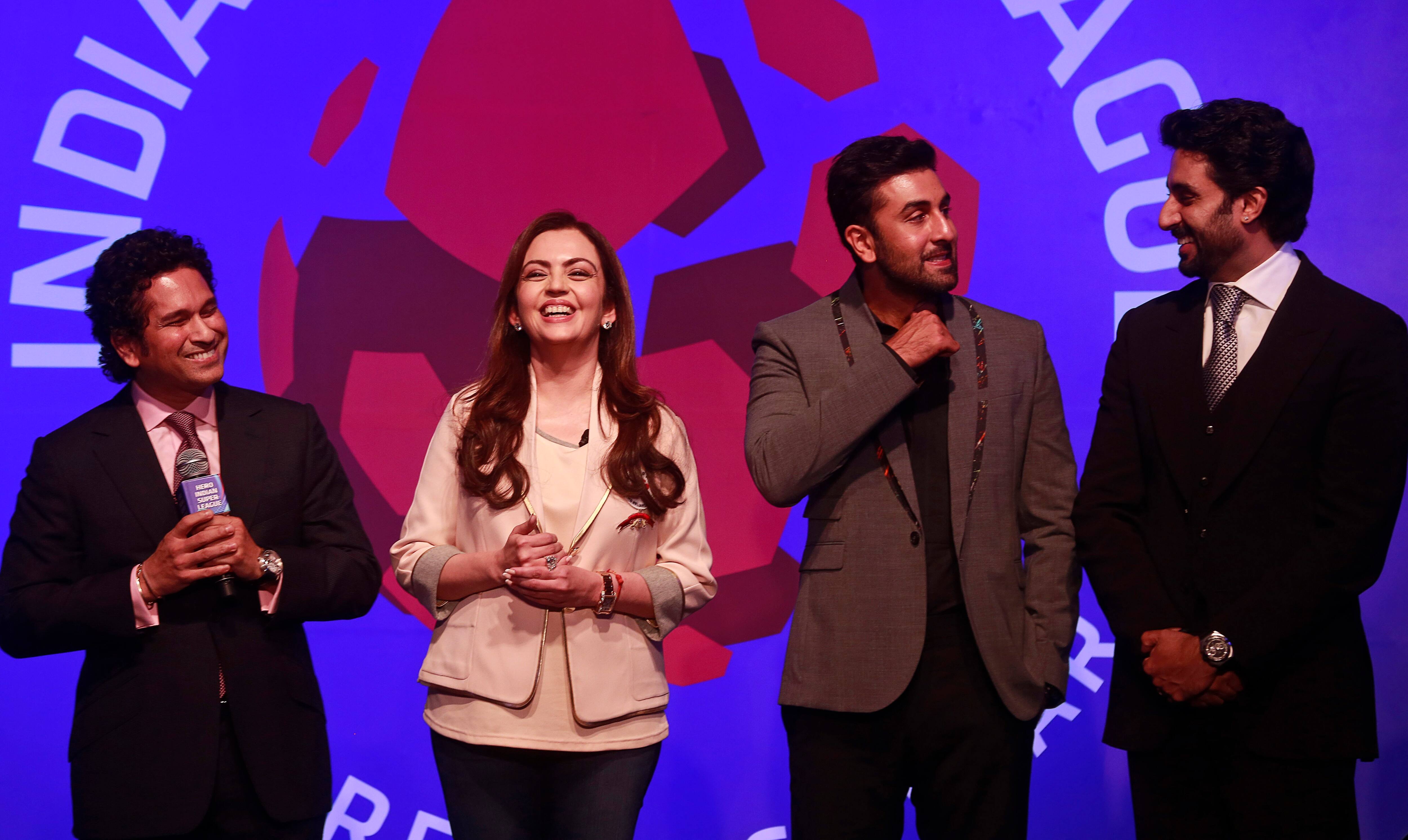 Reliance Foundation Chairman Nita Ambani, stands with former Indian cricketer and co-owner of Kerala Blasters Football Club Sachin Tendulkar, Bollywood actor and co-owner of Mumbai City FC Ranbir Kapoor and Bollywood actor and co-owner of Team Chennai Abhishek Bachchan during the official launch of the Indian Super League (ISL) in Mumbai.