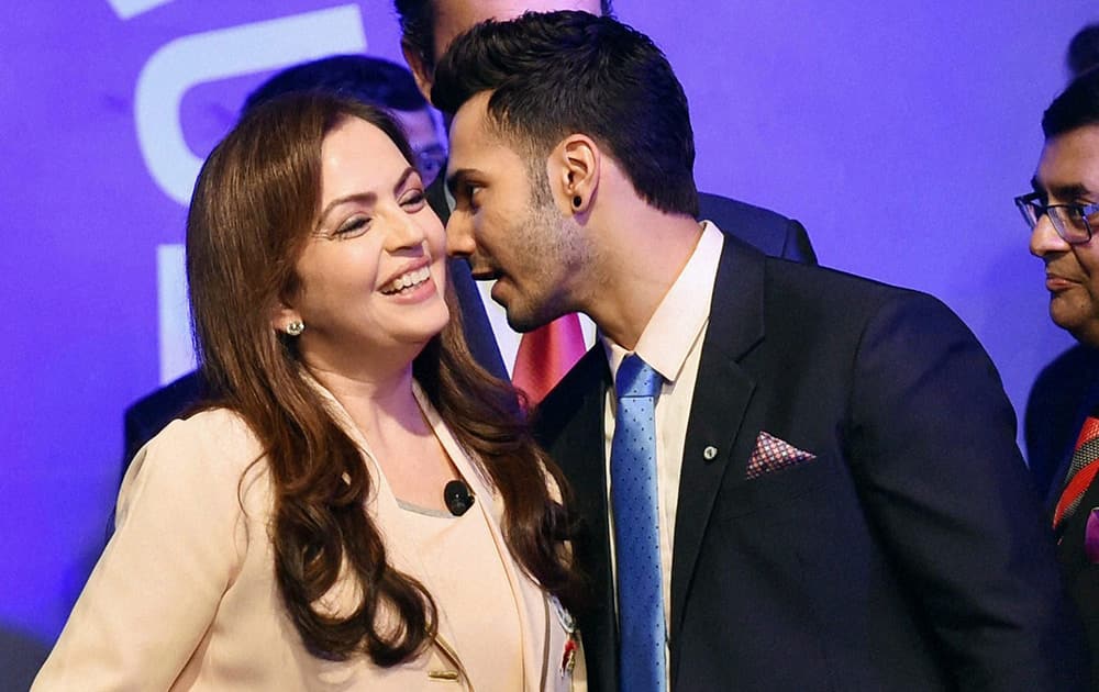 Founding chairperson Nita Ambani with team owner Varun Dhawan at the launch of the Indian Super League in Mumbai.