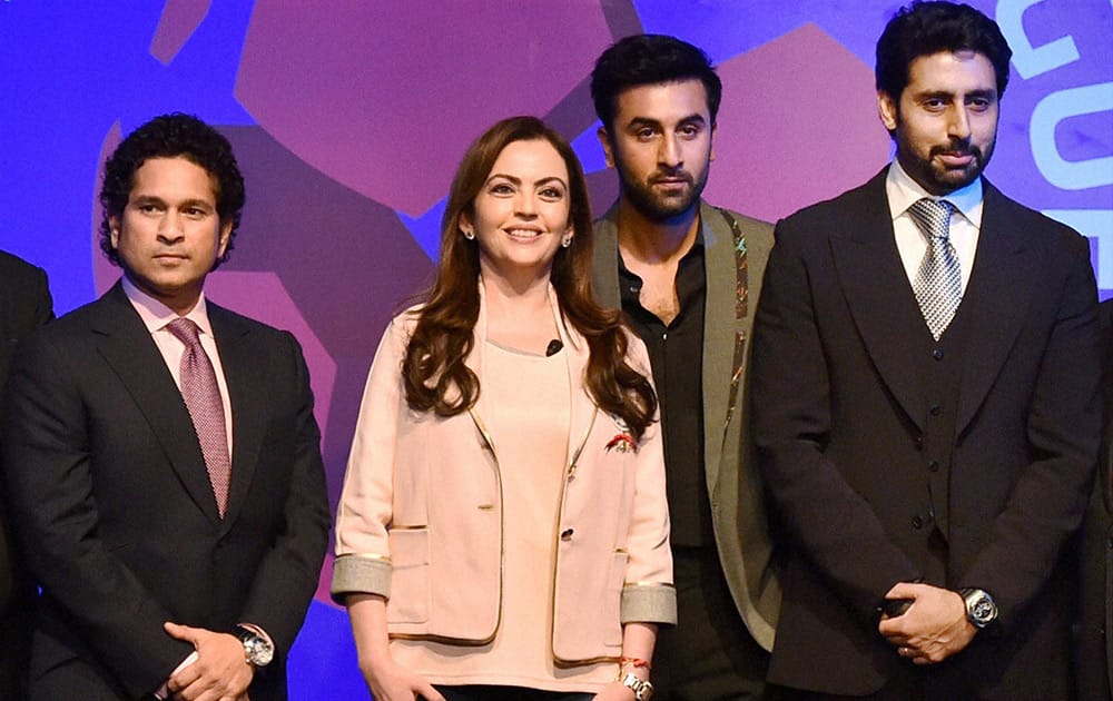 Team owners Sachin Tendulkar, Ranveer Kapoor and Abhishek Bachchan along with founding chairperson Nita Ambani at the launch of the Indian Super League in Mumbai .