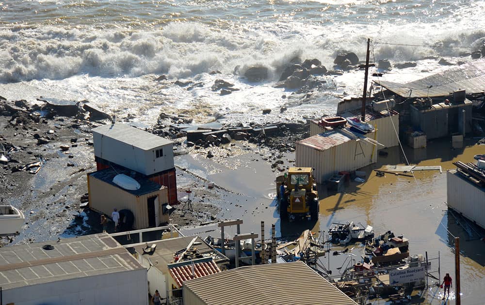 This image provided by Mean Advantage Productions shows damage left after Wednesday's storm on Catalina Island. Pummeled by high surf, the island was subjected to a third day of huge waves and dangerous rip currents as the area felt the ripple effects of Tropical Storm Marie churning off the Mexican coast.