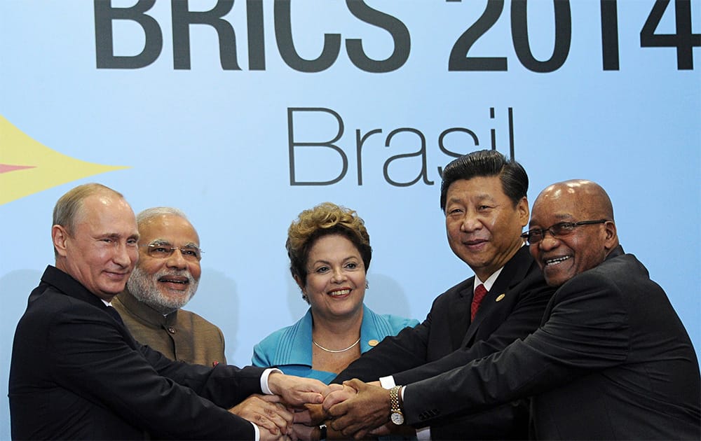 Prime Minister Narendra Modi and the heads of state of the other four BRICS countries — Brazil, Russia, China and South Africa. They signed a 72-point Fortaleza Declaration that announced the New Development Bank with an initial authorised capital of $100 billion and a subscribed capital of $50 billion, and a $100 billion contingency reserve arrangement (CRA)