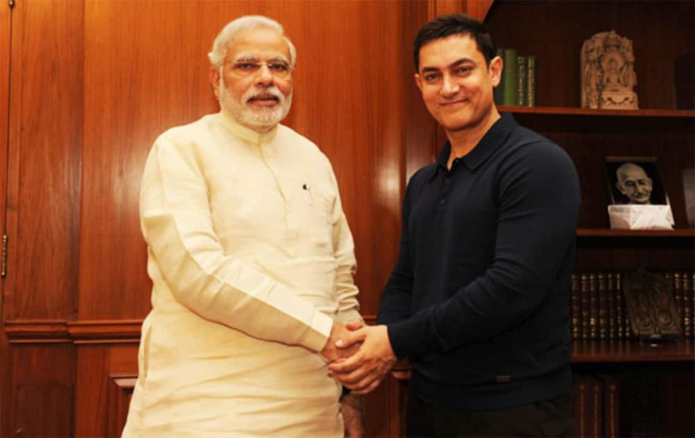PM meets actor Aamir Khan and assures him to look into the problems highlighted in latter's TV show - Satyamev Jayate.