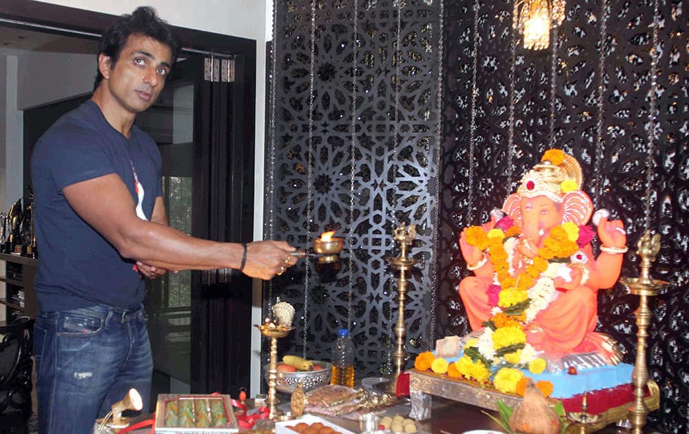 Bollywood actor Sonu Sood offers prayers to a Ganesh idol at his residence on the occasion of Ganesh Chaturthi, in Mumbai.