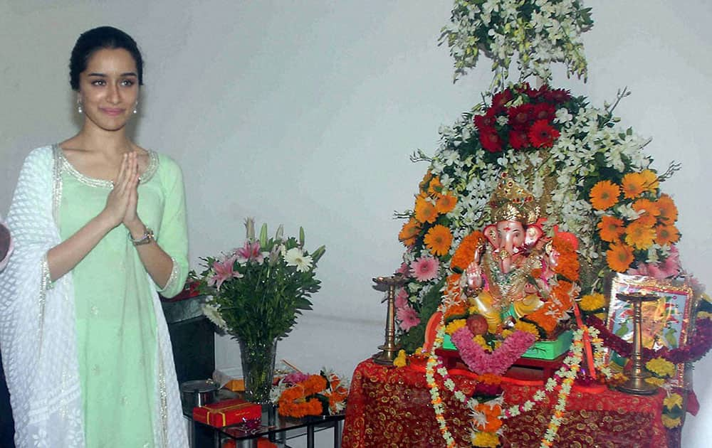 Bollywood actor Shraddha Kapooroffers prayers to a Ganesh idol at her residence on the occasion of Ganesh Chaturthi, in Mumbai.