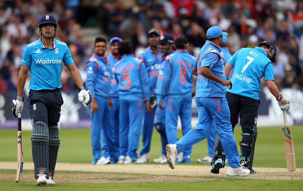 England's Alastair Cook, walks off dejected after losing his wicket during their One Day International cricket match against India at the Trent Bridge cricket ground in Nottingham, England.