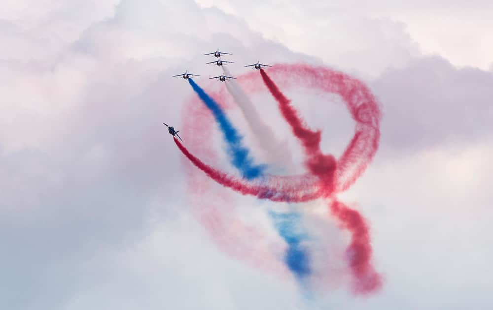 Alpha jets of Frances's aerobatic team Patrouille de France fly in formation at the air show in Payerne, Switzerland.