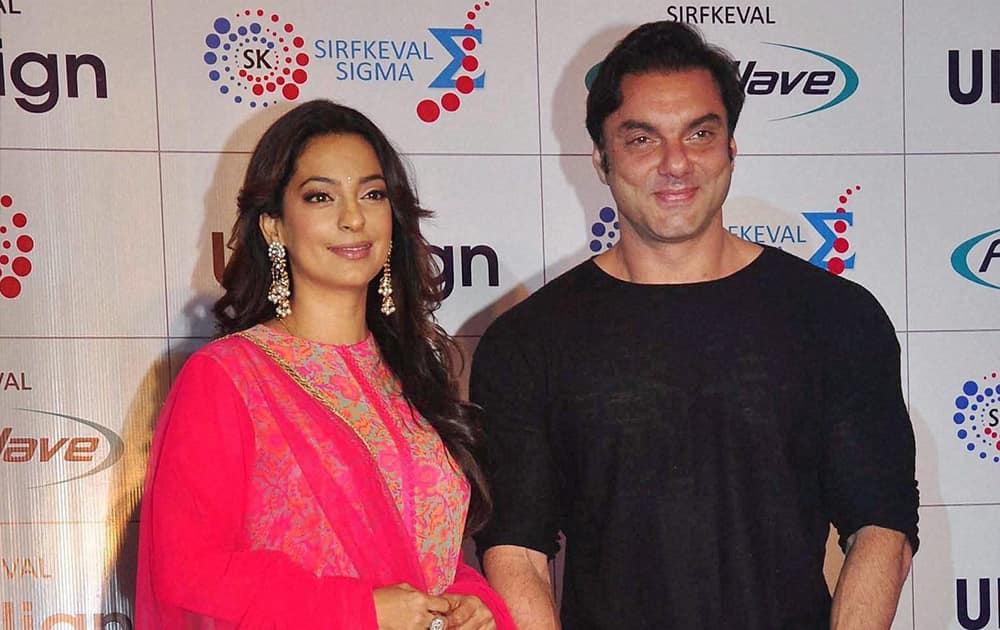 Bollywood actors Juhi Chawla with Sohail Khan at a promotional event in Mumbai.